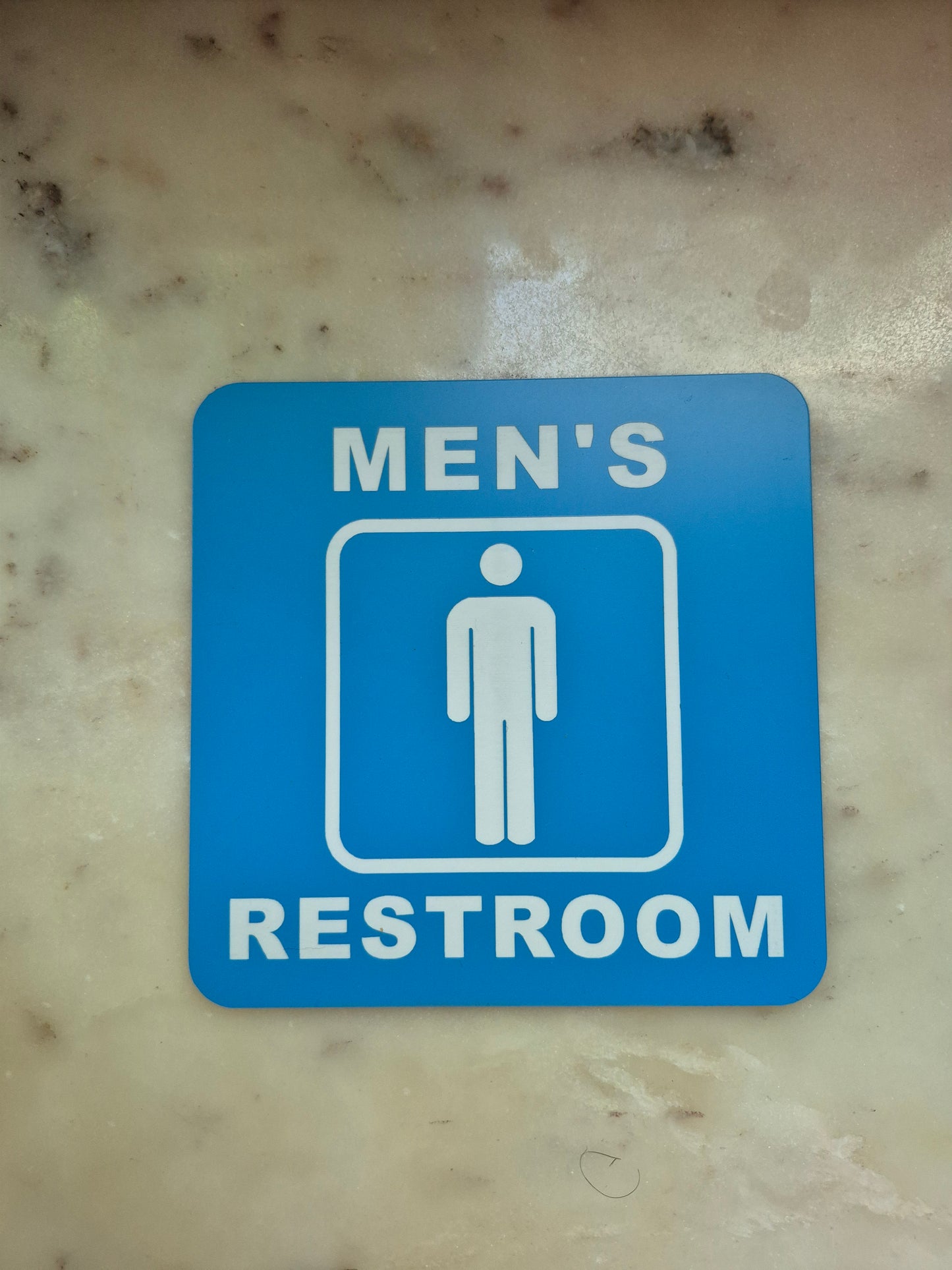 MEN'S RESTROOM sign