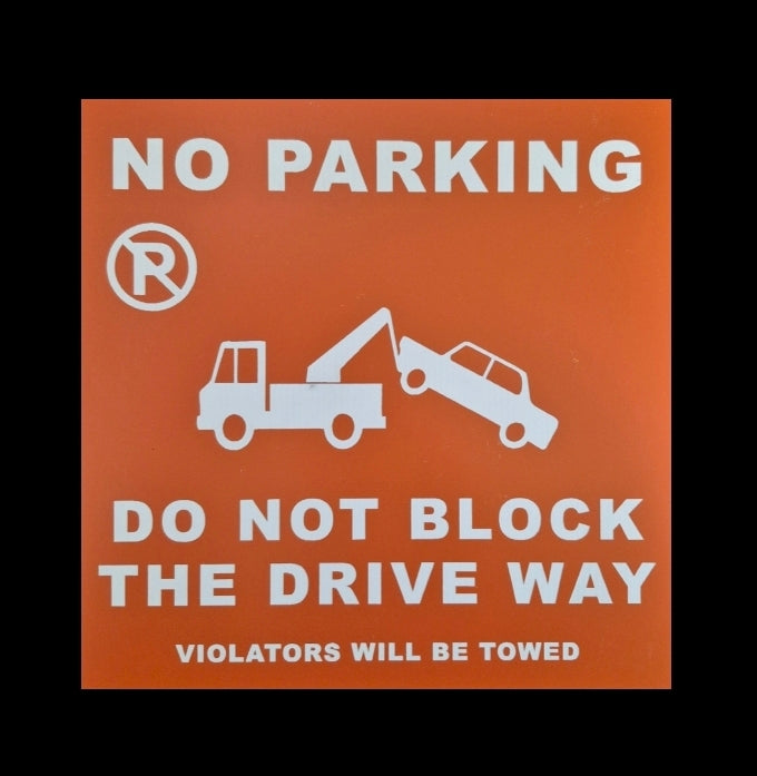 DO NOT BLOCK THE DRIVE WAY/NO PARKING sign