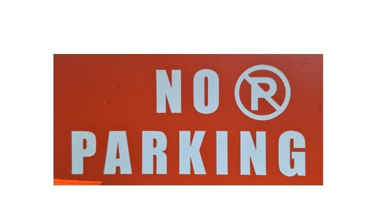 NO PARKING sign