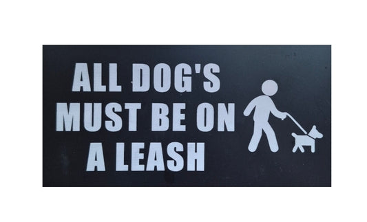 ALL DOG'S MUST BE ON A LEASH sign