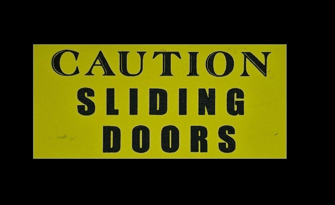 CAUTION SLIDING DOORS sign